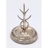 An antique sterling silver tree ring holder, weighted circular base. Full Hallmarked Birmingham,