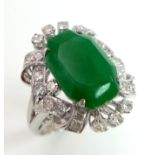 An Art Deco Style 18K White Gold, Jade and Diamond Ring. Large octagonal cut jade with a healthy