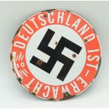 A Vintage German Nazi Enamel Metal Sign ‘Deutschland 1st Erwacht’. 15cm Diameter. This appears to be