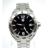 A TAG-HEUER "FORMLA 1 " STAINLESS STEEL AUTOMATIC GENTS WATCH, WATER RESISTANT TO 200 METERS. 42mm