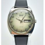 A Vintage Camy Super Automatic Club Star Gents Watch. Black leather strap and stainless steel case -