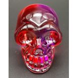 A Hand-Carved Purple/Red Crystal Quartz Skull Figure. 5cm x 4cm.