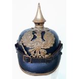 WW1 1895 Model Imperial German Pickelhaube with chinstrap and cockles. Unit marked to the 70 th (