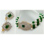 A Green Jade and Cultured Pearl Three Row Choker Necklace. Artistic jade and white stone centre-