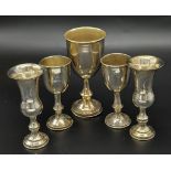 An antique collection of silver Kiddush cups. Hallmarked Birmingham, 1910. Total weight 189.35G.