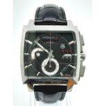 A Tag Heuer Monaco LS Automatic Gents Chronograph Watch. Black leather strap with Tag clasp.