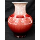 An 18th Century Chinese Red Glaze Yu Hu Chun Porcelain Vase. Beautiful crackle effect throughout.