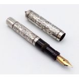 A vintage sterling silver Grieshaber fountain pen with 14K Chicago yellow gold. Nicely embossed