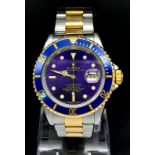 A ROLEX SUBMARINER WATCH WITH STUNNING BLUE DIAL AND MATCHING BLUE BEZEL , BI-METAL STRAP . EVERY