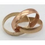 A 9 K yellow and rose gold triple band ring, size: J, weight: 5 g.