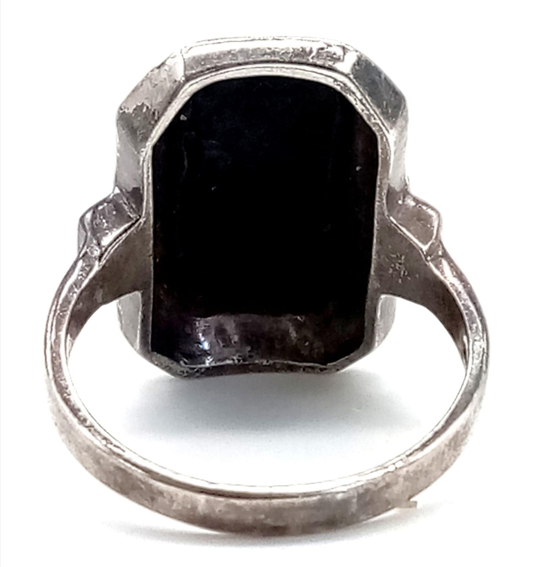 A 925 silver large black onyx with gemstone decoration surrounding. Total weight 5.85G. Size Q. 2 - Image 4 of 5