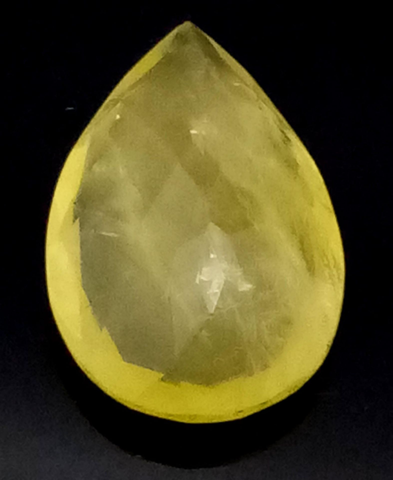 A 41.65ct Faceted Heliodor Yellow Aquamarine Pear-Shaped Gemstone. Comes with a GLI Certificate. - Image 3 of 4