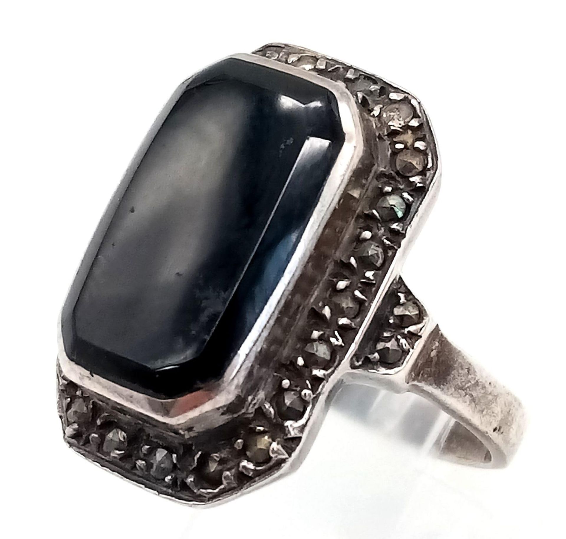 A 925 silver large black onyx with gemstone decoration surrounding. Total weight 5.85G. Size Q. 2 - Image 3 of 5