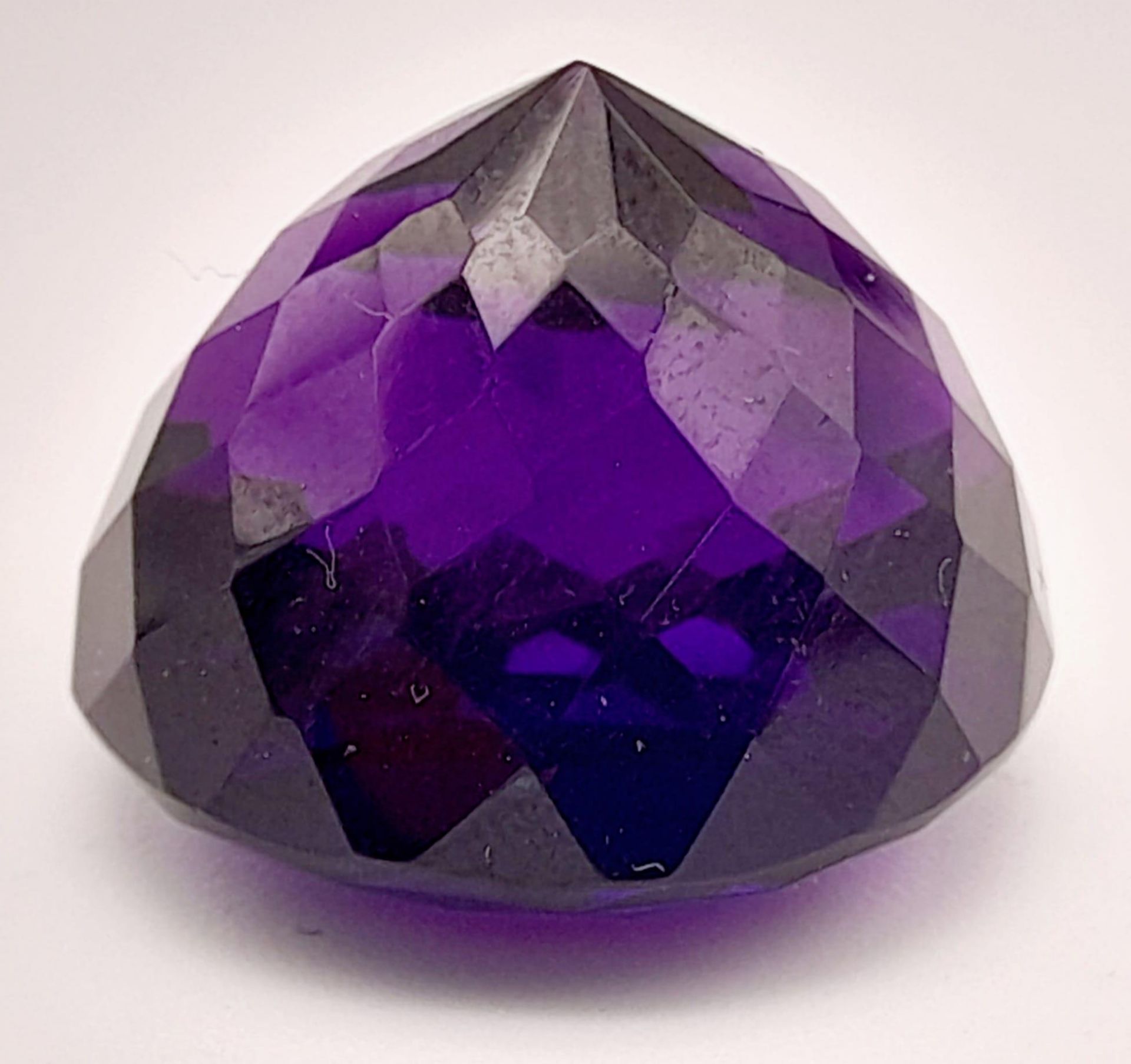 A 36ct Amethyst. Well faceted. Cushion trillion cut. 20mm x 15mm. No certificate so a/f. - Image 2 of 2