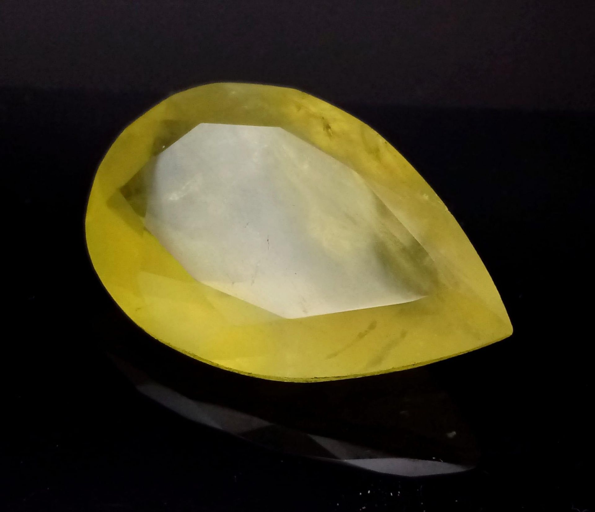 A 41.65ct Faceted Heliodor Yellow Aquamarine Pear-Shaped Gemstone. Comes with a GLI Certificate.