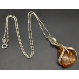 A Vintage Modernist Design, Sterling Silver and Amber Set Pendant Necklace. 46cm Length, set with