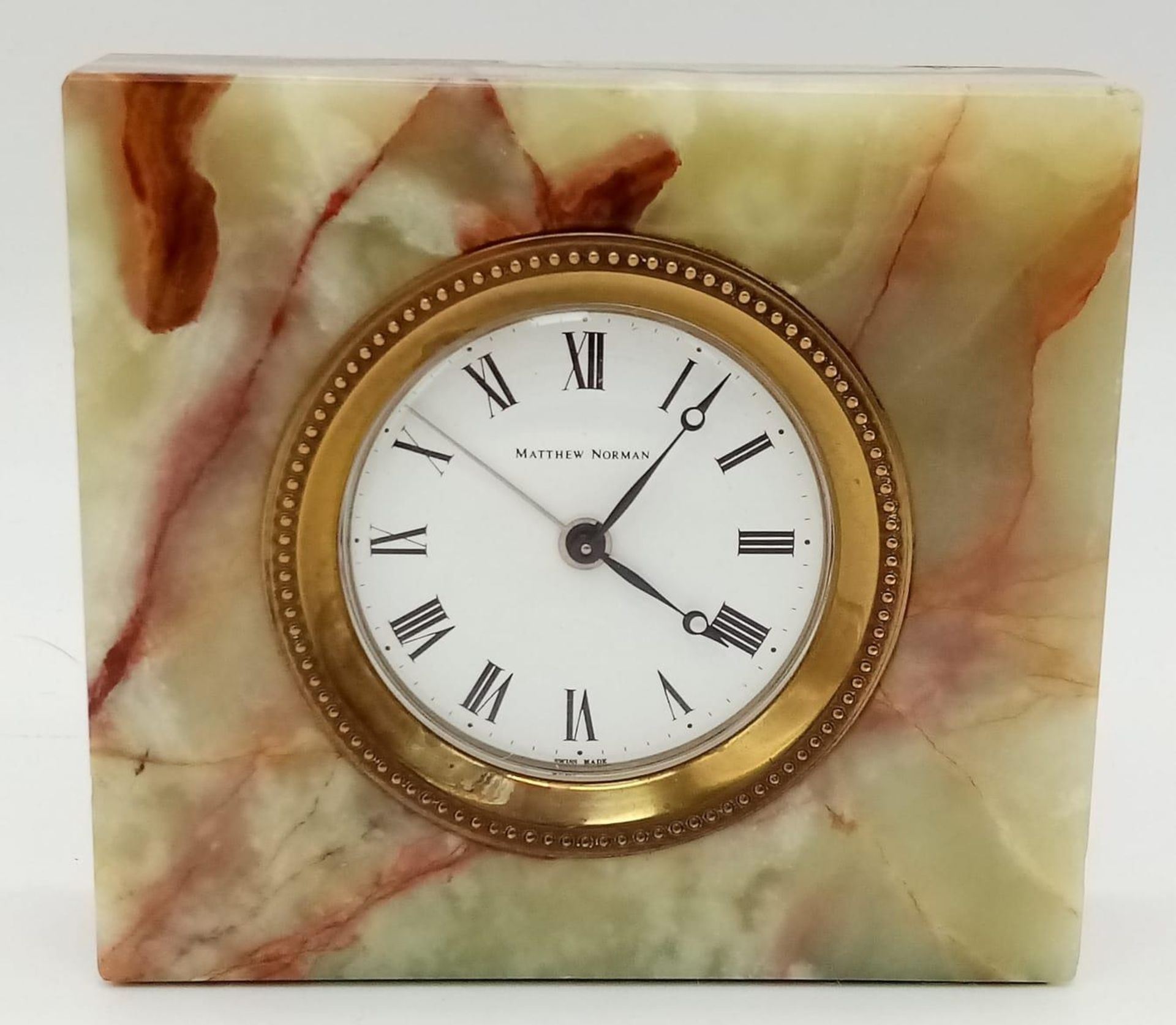 A Vintage Matthew Norman Onyx Desk Clock. Mechanical movement in good condition and working order.