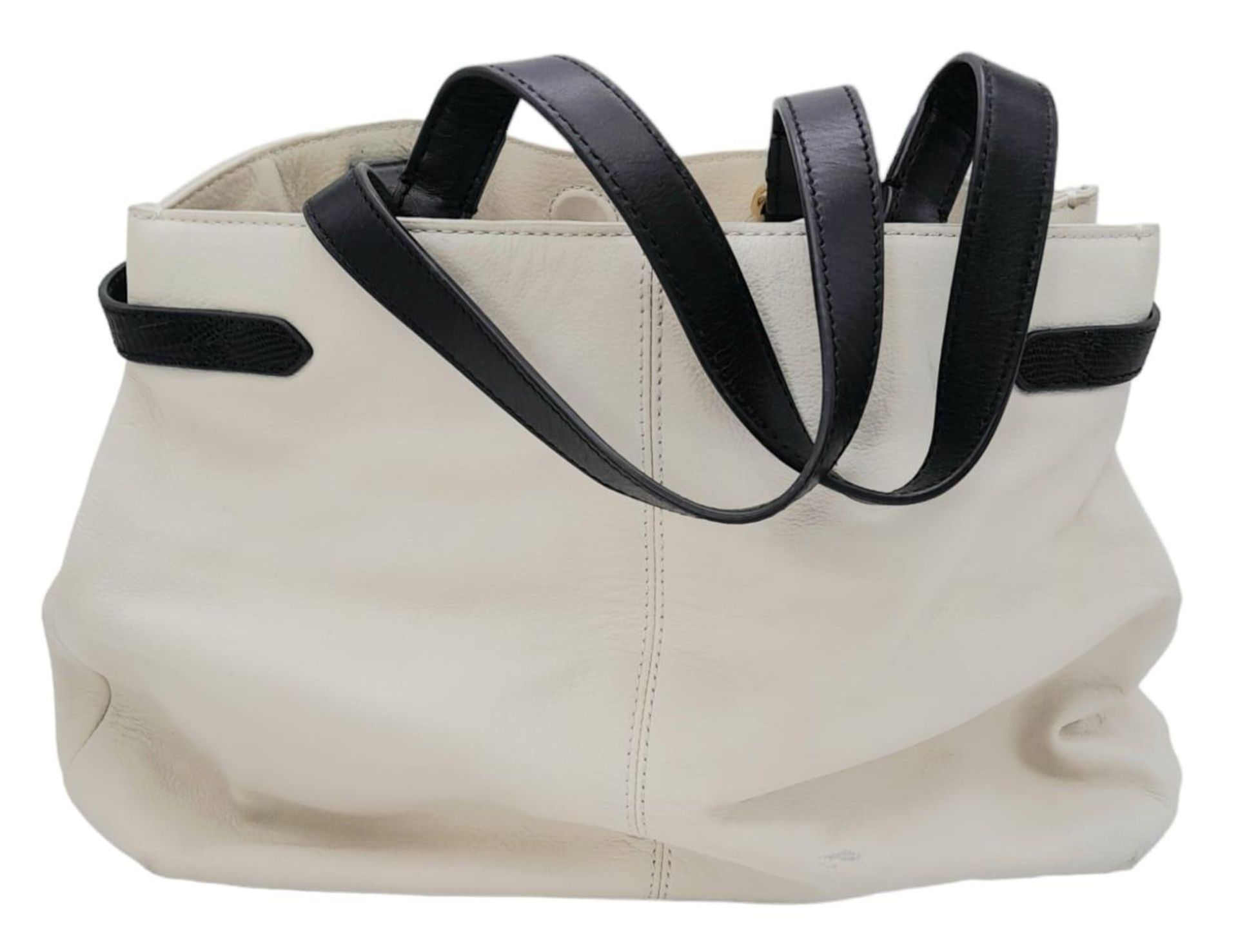 A Jaeger White Leather Handbag. White leather exterior with black leather belt closure and - Image 3 of 8