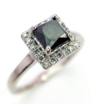 A WGI certified platinum ring set with square-cut black diamond and a halo of twenty round brilliant