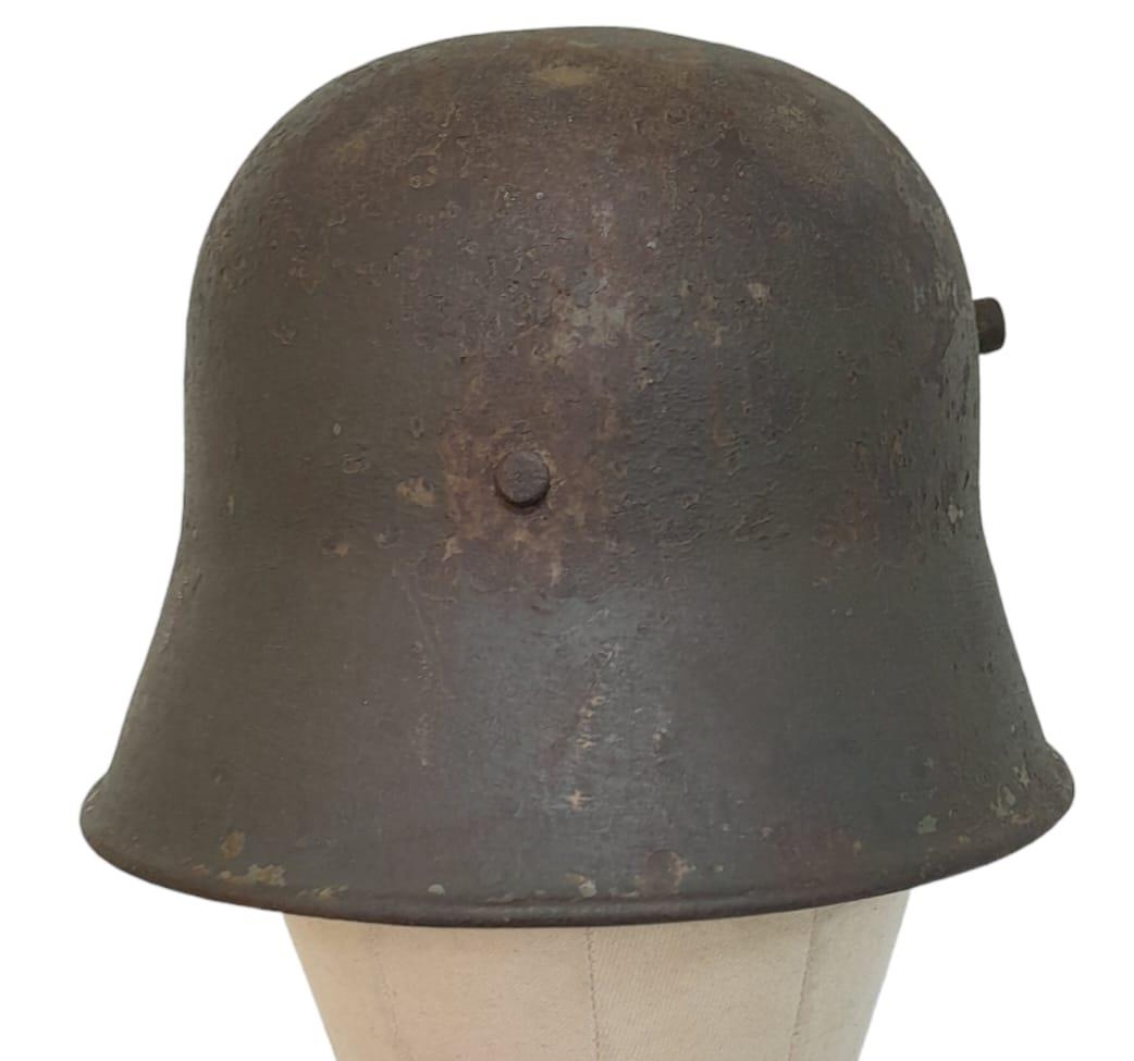 Inter War Period German Friekorps Helmet. A WW1 Imperial German M18 Helmet shell with a 1935 model - Image 4 of 5