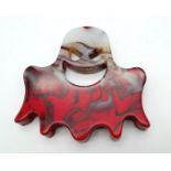 A Hand-Carved Flame Agate Spectre. Figure or ghoulish paperweight. 8cm x 8cm.