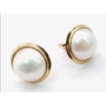A Pair of 9K Yellow Gold Cultured Pearl Cabochon Earrings. 2.4g total weight. As new.