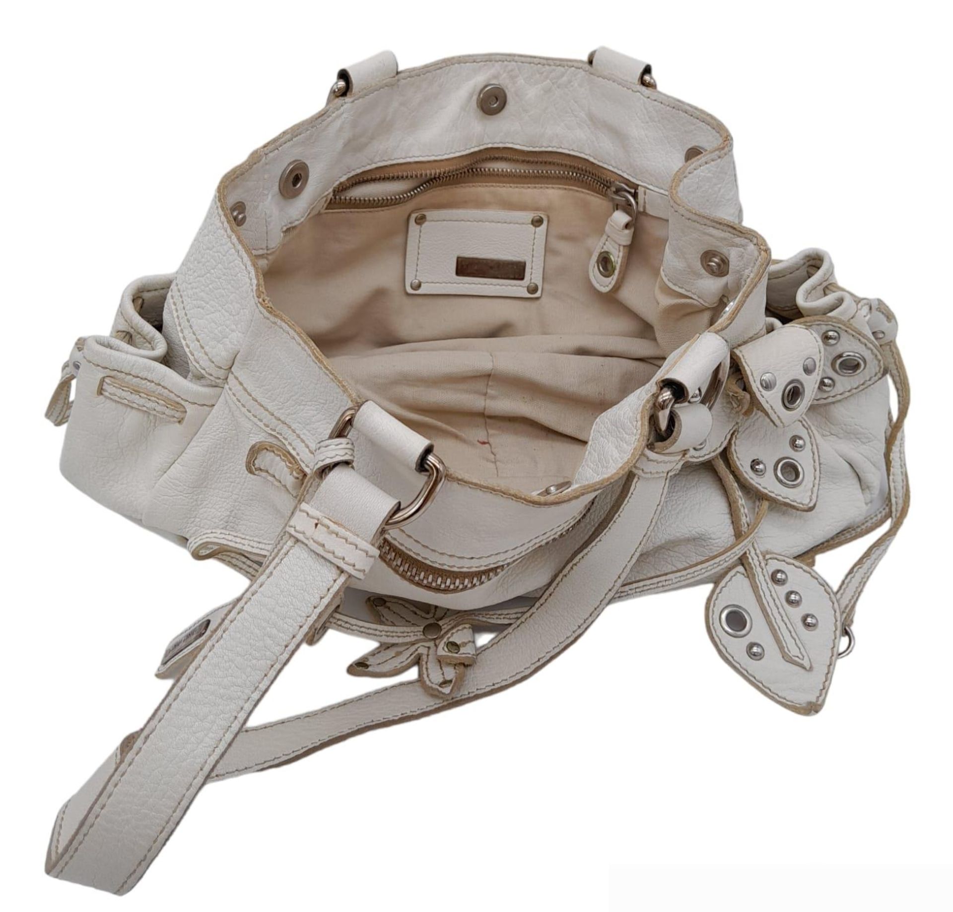 A Miu Miu White Leather Handbag. Ruffled white leather exterior with zipped pocket. Silver-tone - Image 7 of 8