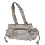 A Miu Miu White Leather Handbag. Ruffled white leather exterior with zipped pocket. Silver-tone