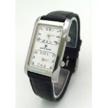 A Vintage Pierre Cardin Dual Time Quartz Watch. Black leather strap. Elongated case. In working