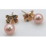 A Pair of 9K Yellow Gold Small Cultured Pink Pearl Earrings. 0.6g total weight. As new.