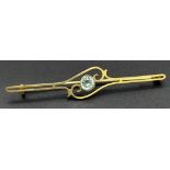 An Antique 9K Yellow Gold Aquamarine Bar Brooch. Pin has been replaced. 6.5cm. 2.85g total weight