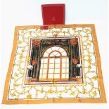 A Cartier Silk Scarf. As new, in Cartier box with authenticity card.