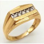 A GENTS 14K GOLD RING WITH 5 DIAMONDS CHANNEL SET IN ATTRACTIVE DESIGN . 5.3gms size Y
