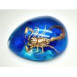 A Scorpion Turns the Air Blue with a Joke About the Actress and a Bishop. Pendant or paperweight.