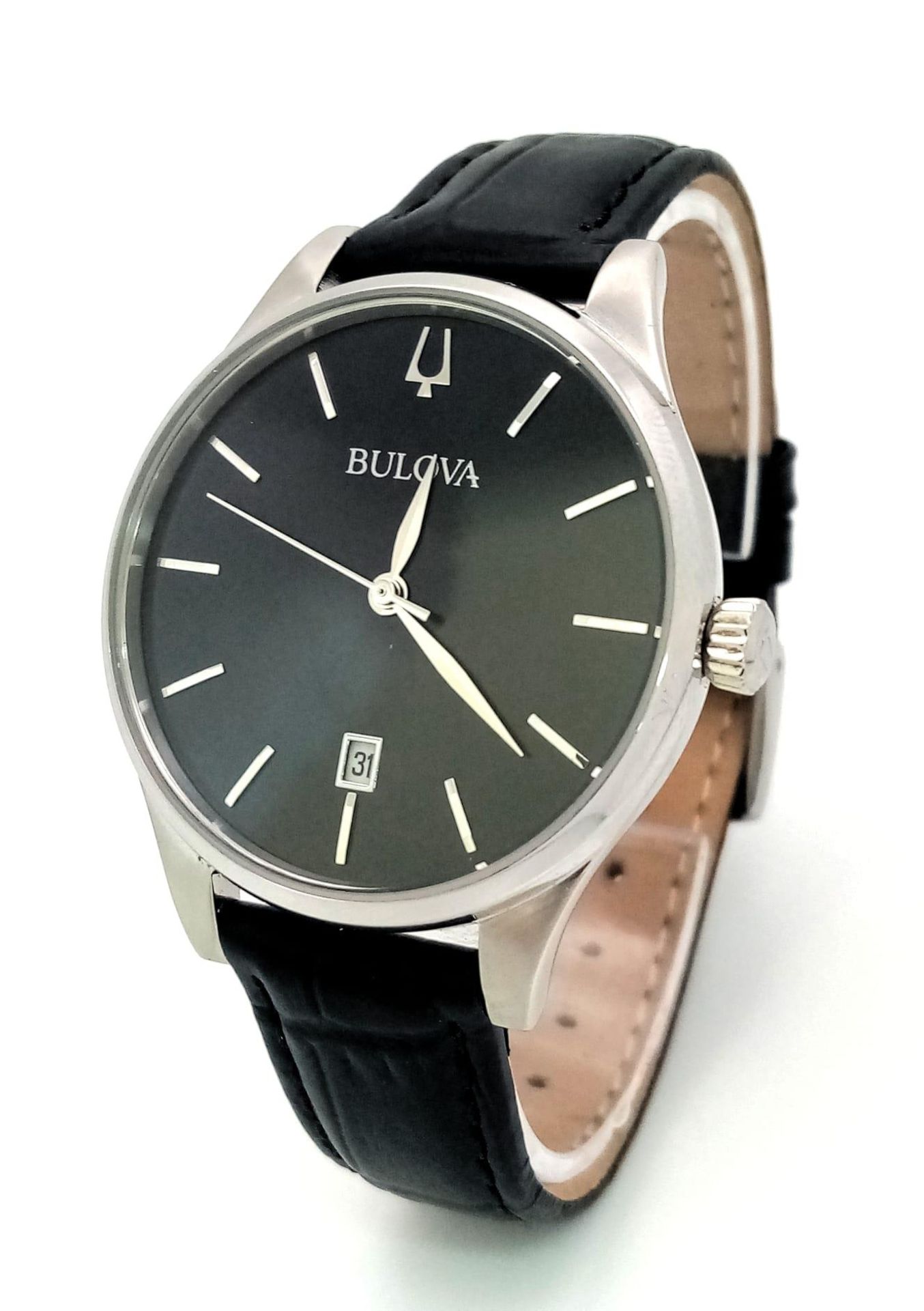 A Classic Bulova Quartz Unisex Watch. Black leather strap. Stainless steel case - 36mm. Black dial