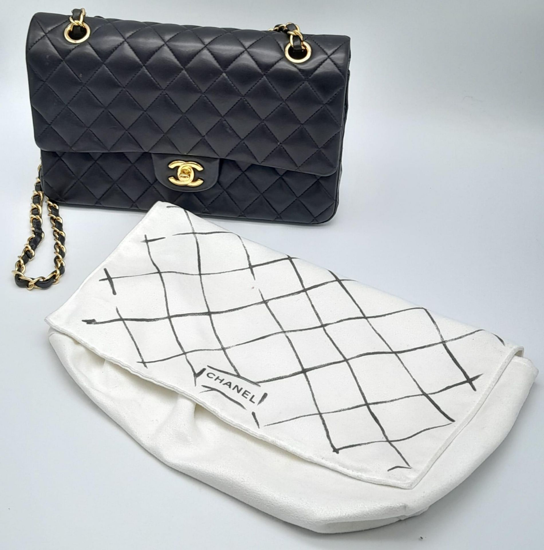 A Classic Chanel Double Flap Bag. Quilted lambskin black leather exterior with gilded Chanel logo - Image 2 of 13