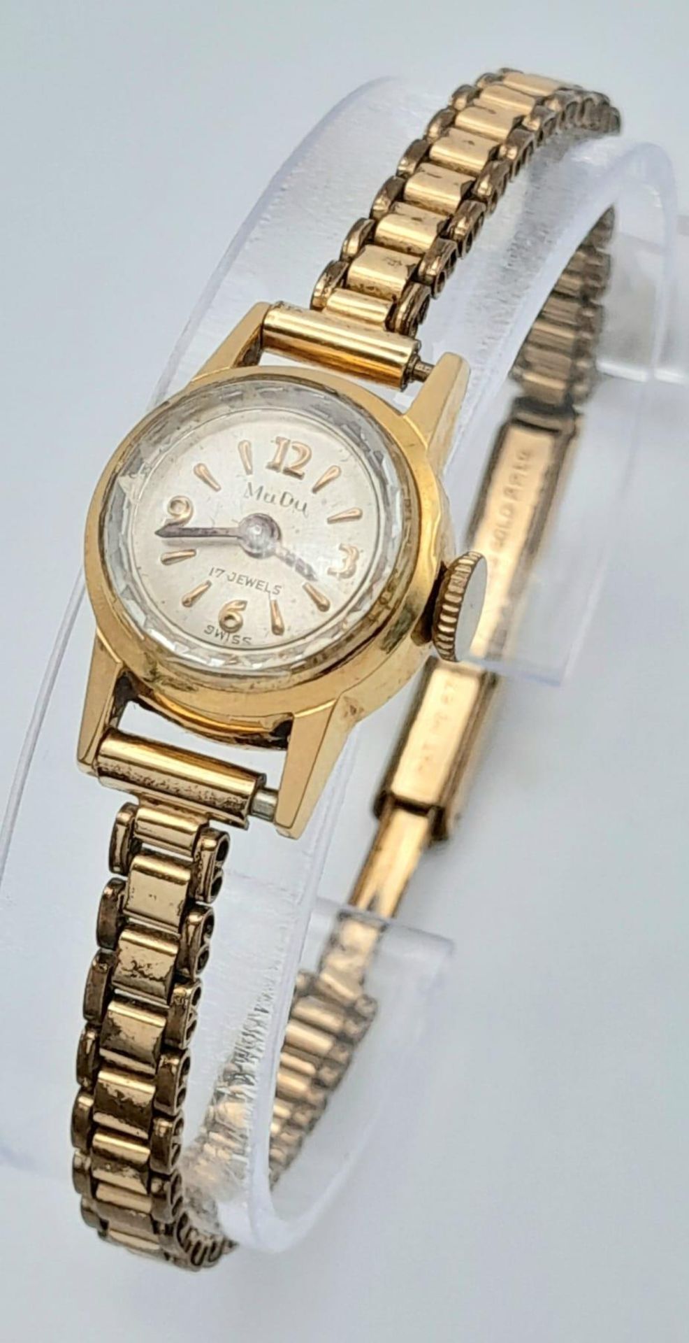 A Vintage 18K Gold Cased Mudo Ladies Watch. Rolled gold bracelet. 18k gold case. Mechanical