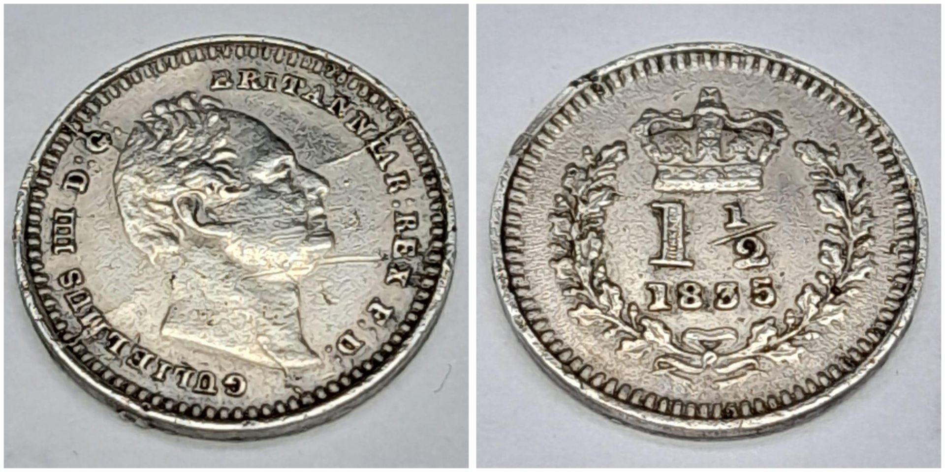 An 1835/4 William IV One and a Half Pence Silver Coin. S3839. Please see photos for conditions.
