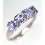 9k white gold diamond and iolite dress ring, size L, weight 1.9g (dia:0.03ct/iolite:0.70ct)