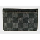 A Louis Vuitton Small Leather Wallet. Checked exterior. 11cm x 7cm. Ref: 13859