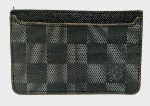 A Louis Vuitton Small Leather Wallet. Checked exterior. 11cm x 7cm. Ref: 13859