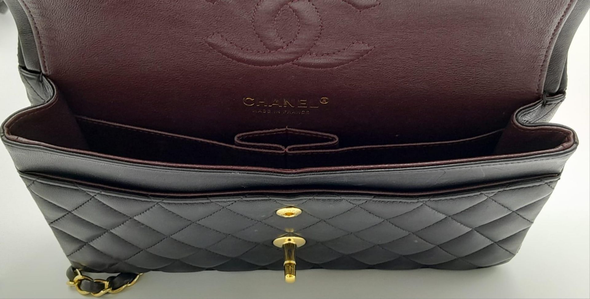 A Classic Chanel Double Flap Bag. Quilted lambskin black leather exterior with gilded Chanel logo - Image 7 of 13