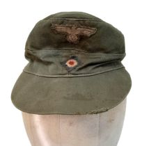 WW2 German Africa Corps M41 Field Cap. A real “Been There” item.