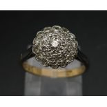 A Vintage 18K Yellow Gold and Platinum Diamond Ring. An array of diamonds in a platinum setting.