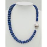 A 375ct Graduated Lapis Lazuli Faceted Bead Necklace with Pearl and 925 Silver Clasp. 44cm length.