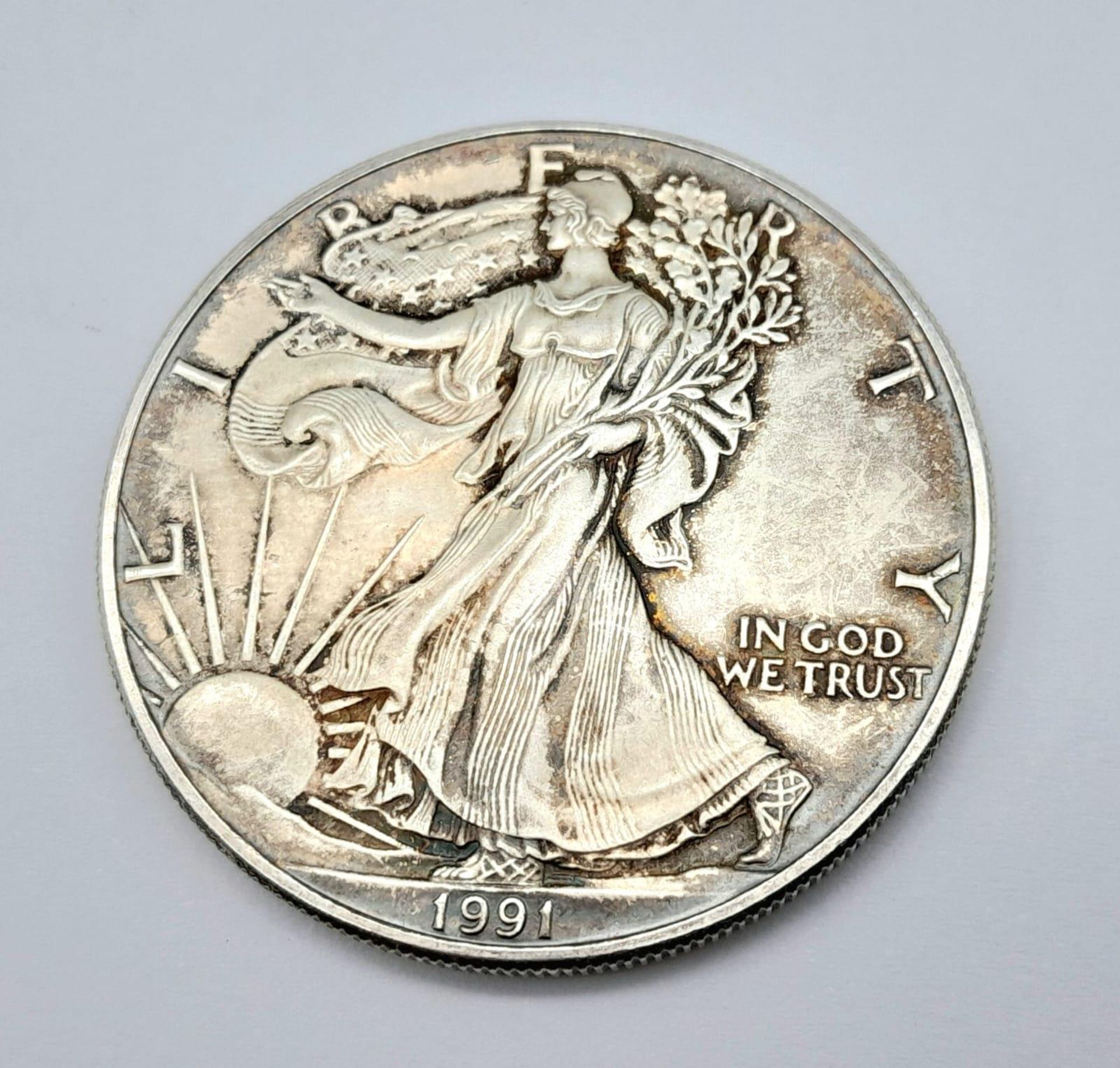 An Uncirculated Mint State Condition 1991 United States Silver Eagle. 31.37 Grams Fine .999
