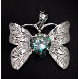 A 2ct Blue Moissanite Butterfly Pendant set in 925 Silver. 25mm - comes with a GLI certificate.