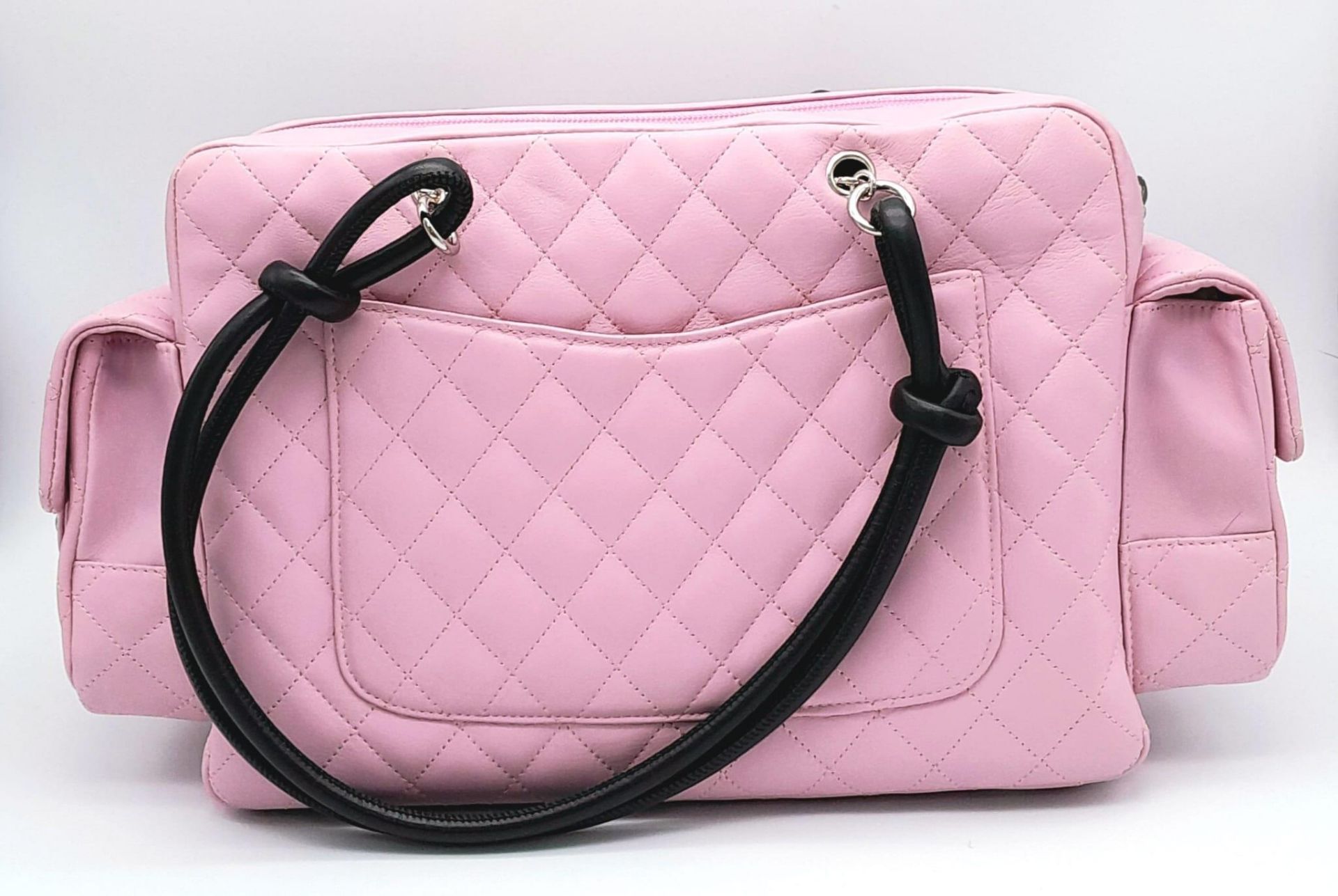 A Chanel Cambon Reporter Barbie Pink Leather Handbag. Quilted pink leather exterior with silver-tone - Image 6 of 14