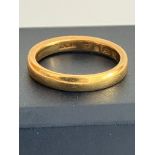 22 carat GOLD BAND RING. Full UK hallmark. Complete with ring box. 4.57 grams. Size K.