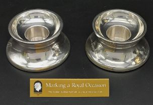 A beautiful pair of Hallmarked Silver Jubilee Candlestick Holders. 6.3cm Diameter. 58.4 grams